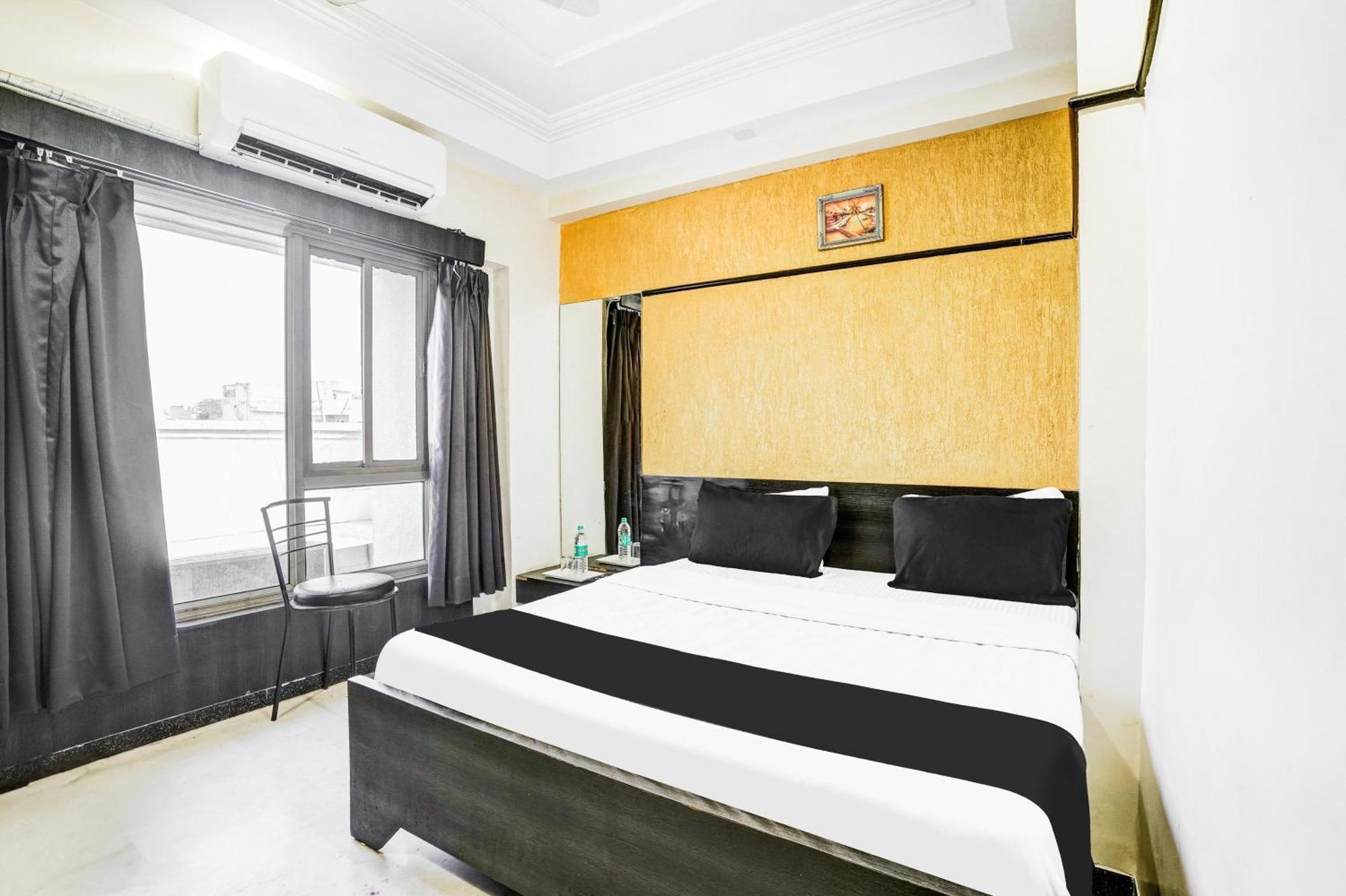 Hotel Super Collection O Ashram Road Near Sardar Bridge Formerly Apple