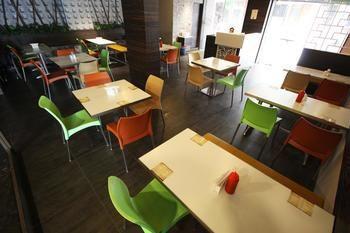 Hotel Oyo Premium Thaltej Cross Rd Sg Highway Ahmedabad