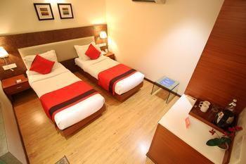 Hotel Oyo Premium Thaltej Cross Rd Sg Highway Ahmedabad