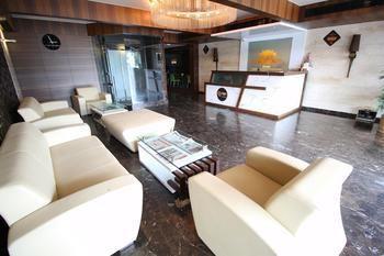 Oyo Premium Thaltej Cross Rd Sg Highway Ahmedabad