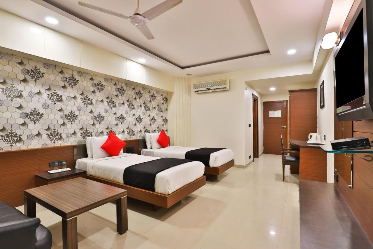 Capital O 15537 Dev Corporate Hotel Ahmedabad