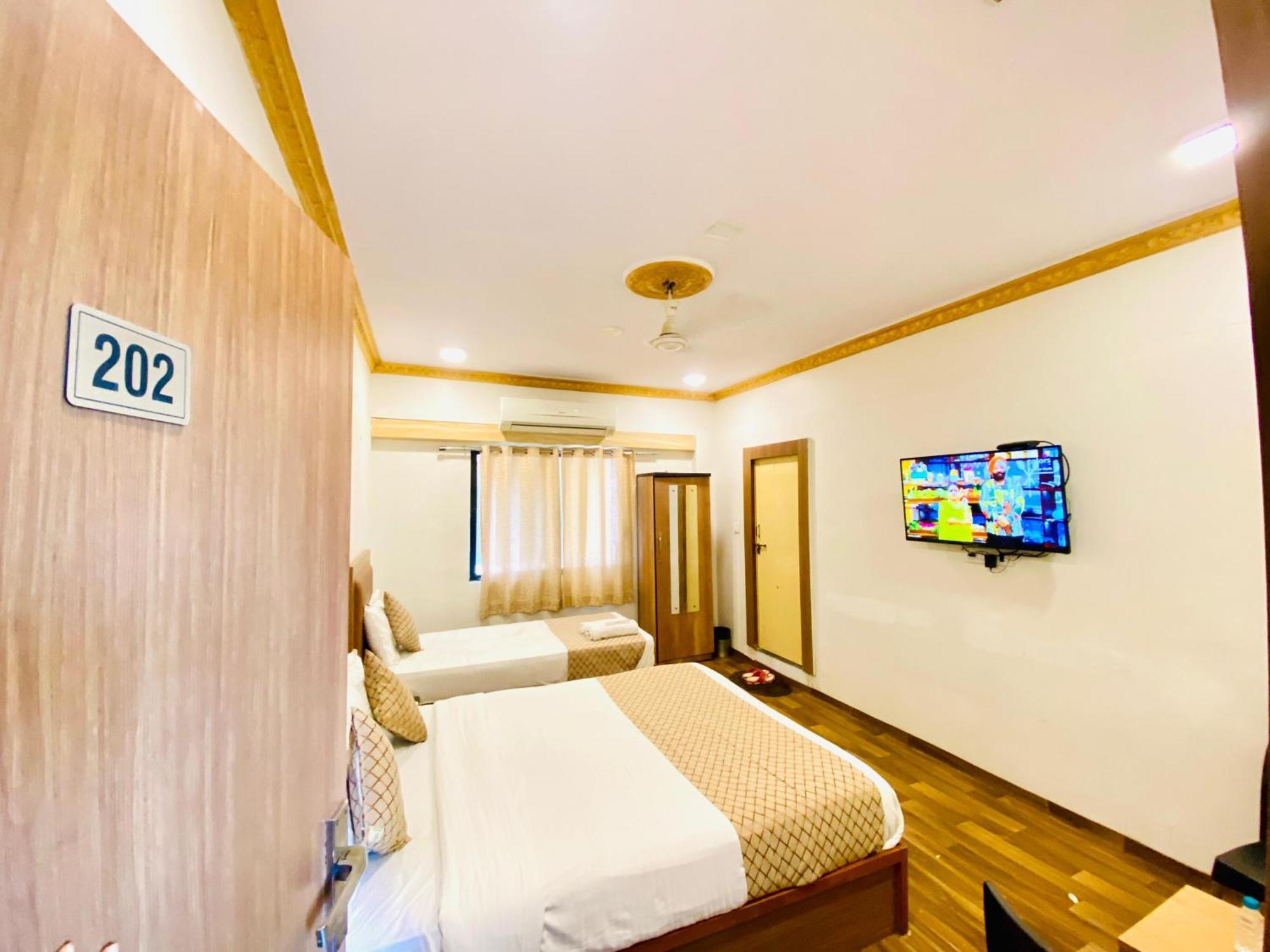 Abc Satellite Prahlad Nagar Hotel